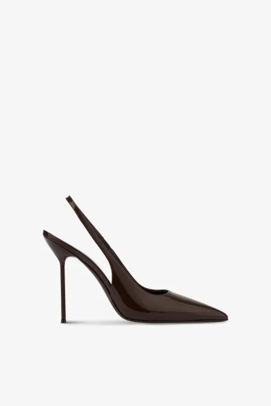 Slingbacks in chocolate patent leather sold by Paris Texas