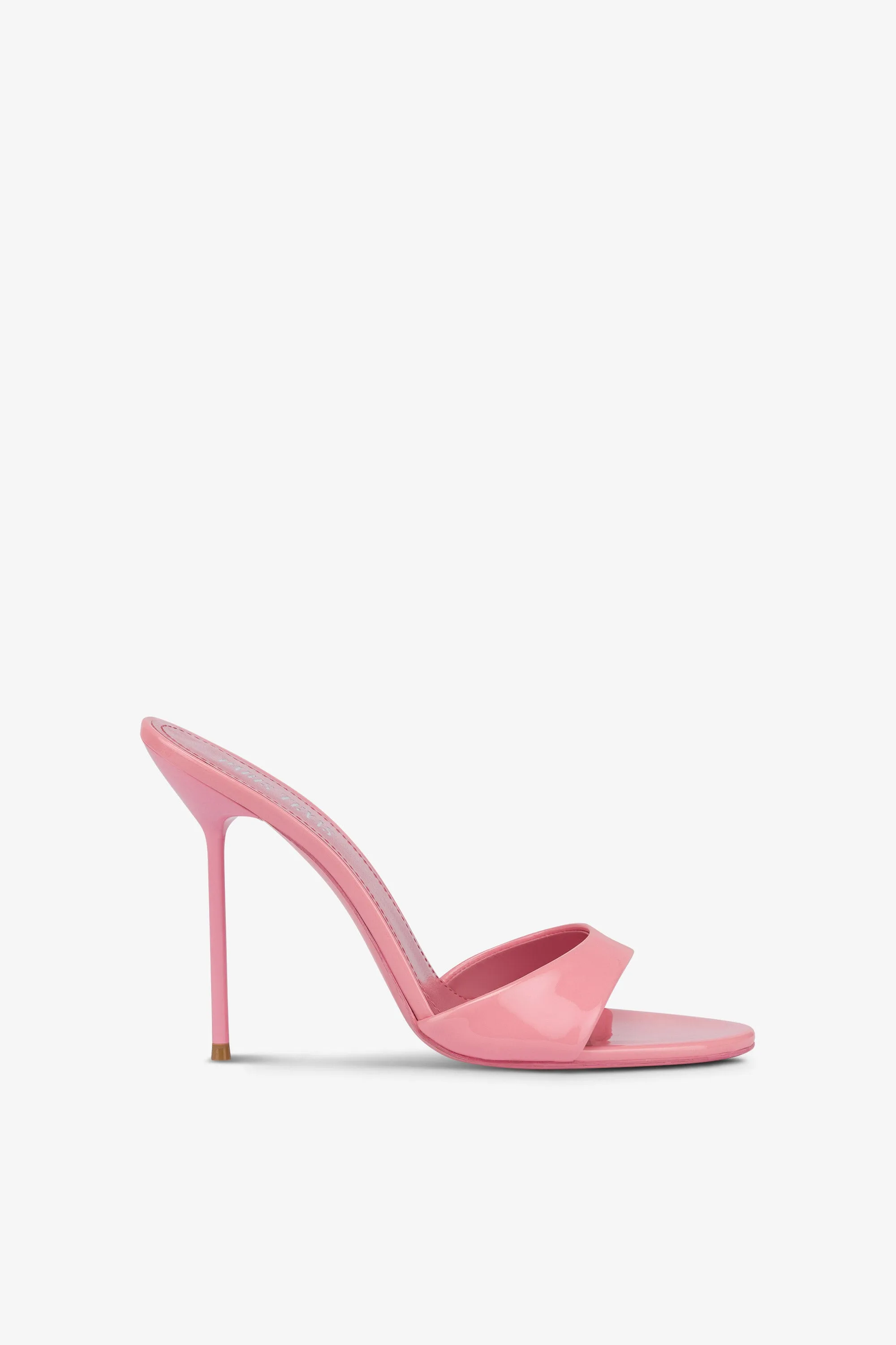 Mules in pink patent leather sold by Paris Texas