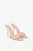 Mules in powder pink patent leather sold by Paris Texas