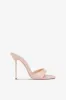 Mules in powder pink patent leather sold by Paris Texas