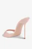 Mules in powder pink patent leather sold by Paris Texas