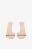Mules in powder pink patent leather sold by Paris Texas