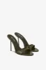 Mules in safari-colored patent leather sold by Paris Texas