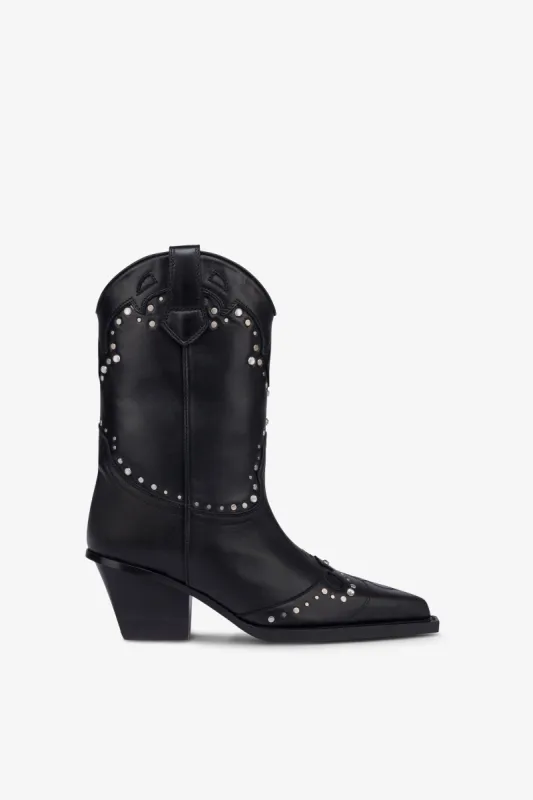 Boots in nickel-studded black leather sold by Paris Texas