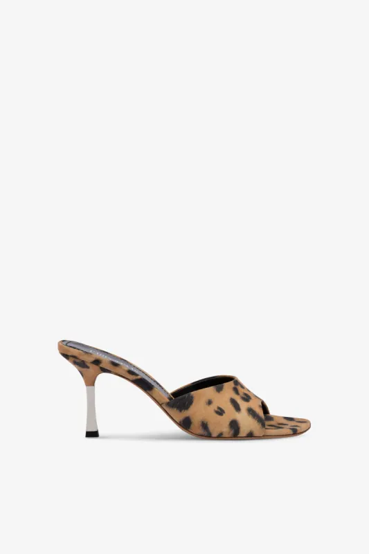 Mules in natural leopard-print suede leather sold by Paris Texas