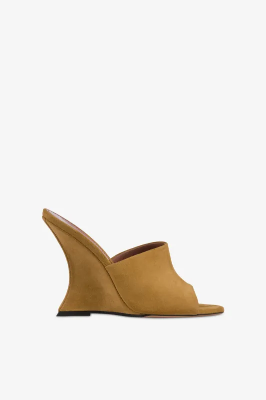 Mules in caramel suede leather sold by Paris Texas