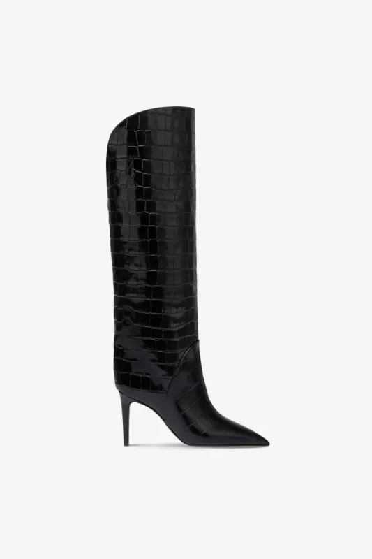 Boots in black croco-embossed leather sold by Paris Texas