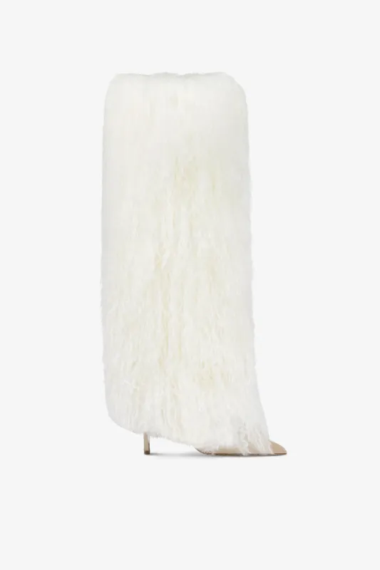 White mongolian fur stiletto boots sold by Paris Texas