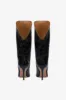 Boots in black croco-embossed leather sold by Paris Texas