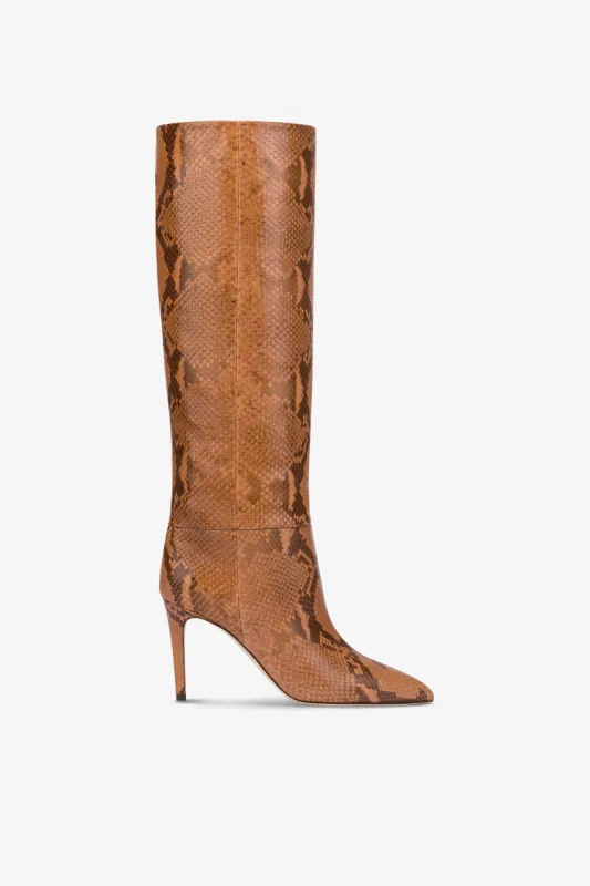 Pointed knee-high boots in canyon soft python-printed leather sold by Paris Texas