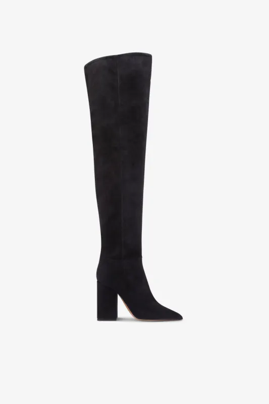 Over-the-knee, long pointed boots in soft off-black suede leather sold by Paris Texas