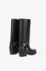 Square-toe boots in smooth black leather sold by Paris Texas