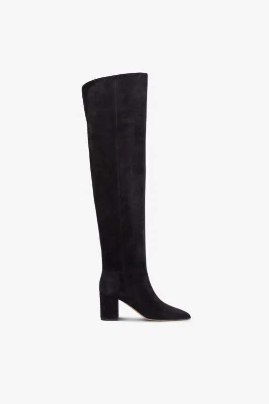 Over-the-knee, long, pointed boots in off-black suede leather sold by Paris Texas