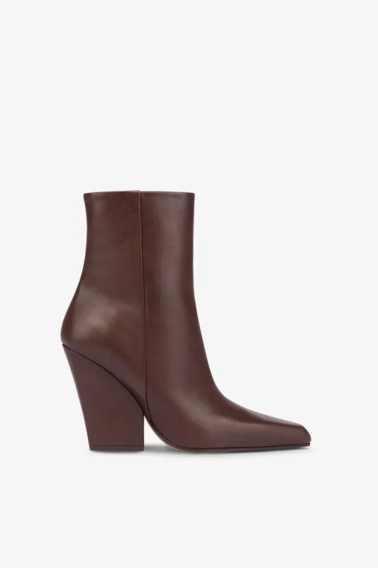 Pointed ankle boots in smooth mocha leather sold by Paris Texas
