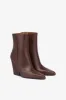 Pointed ankle boots in smooth mocha leather sold by Paris Texas