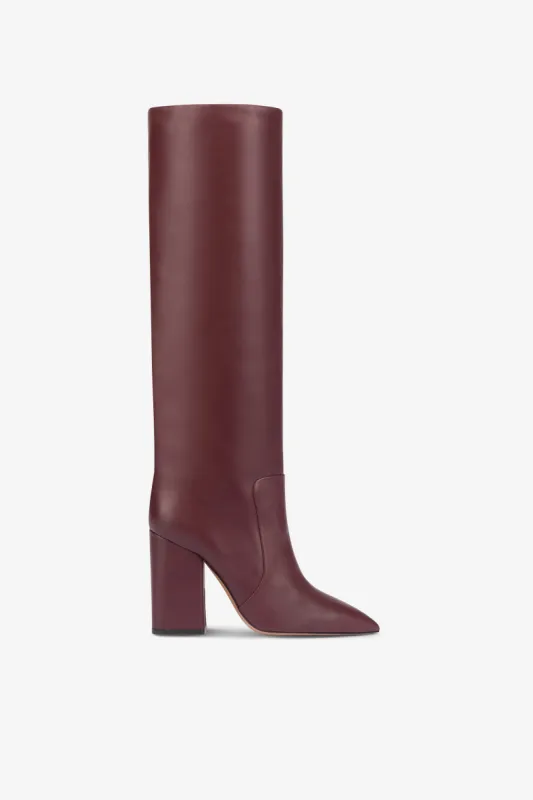 Knee-high boots in smooth burgundy leather sold by Paris Texas