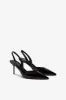 Long, pointed slingbacks in patent black leather sold by Paris Texas