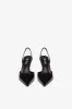 Long, pointed slingbacks in patent black leather sold by Paris Texas
