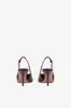Sharp, pointed slingback pumps in hevea soft croco-embossed leather sold by Paris Texas