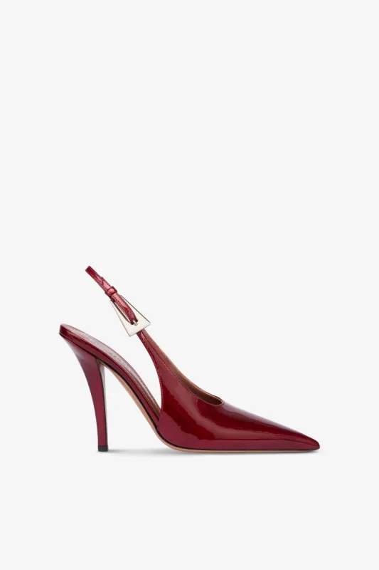 Sharp, pointed slingback pumps in patent pinot noir glossy leather sold by Paris Texas