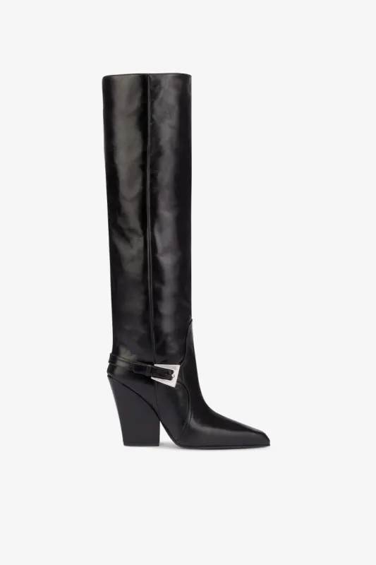 Tall, knee-high boots in shiny black vintage leather sold by Paris Texas