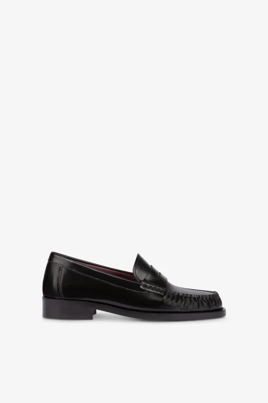 Loafer shoes in soft black brushed leather sold by Paris Texas