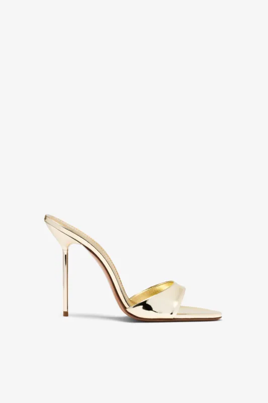 Gold mirrored leather mule sold by Paris Texas
