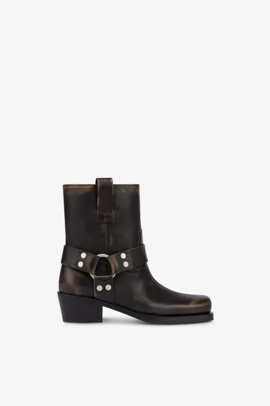 Square-toe ankle boots in soft black brushed leather sold by Paris Texas