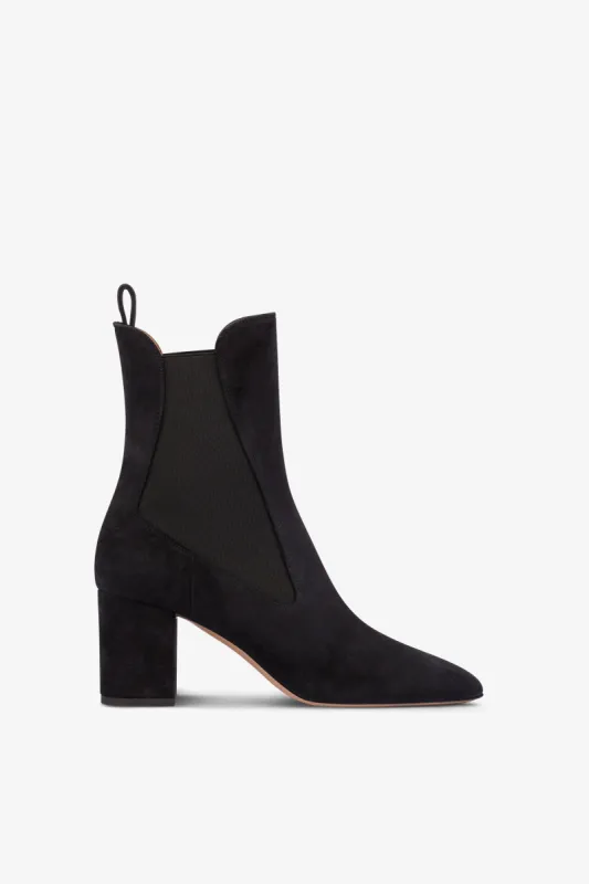 Pointed ankle boots in soft off-black suede leather sold by Paris Texas