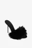 Mules in black satin and faux fur sold by Paris Texas