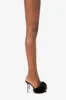 Mules in black satin and faux fur sold by Paris Texas
