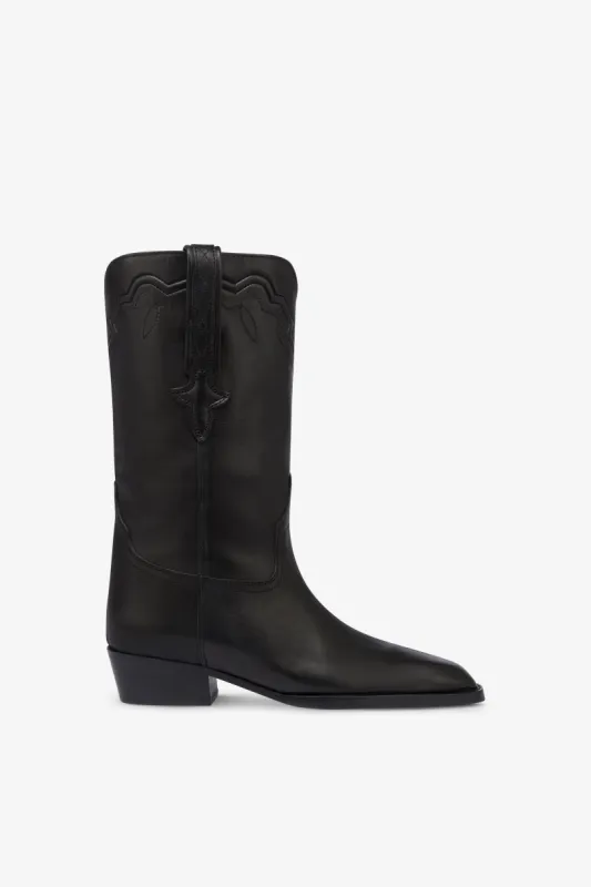 Boots in black leather sold by Paris Texas