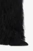 Boots in off-black faux fur sold by Paris Texas