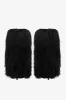 Boots in off-black faux fur sold by Paris Texas