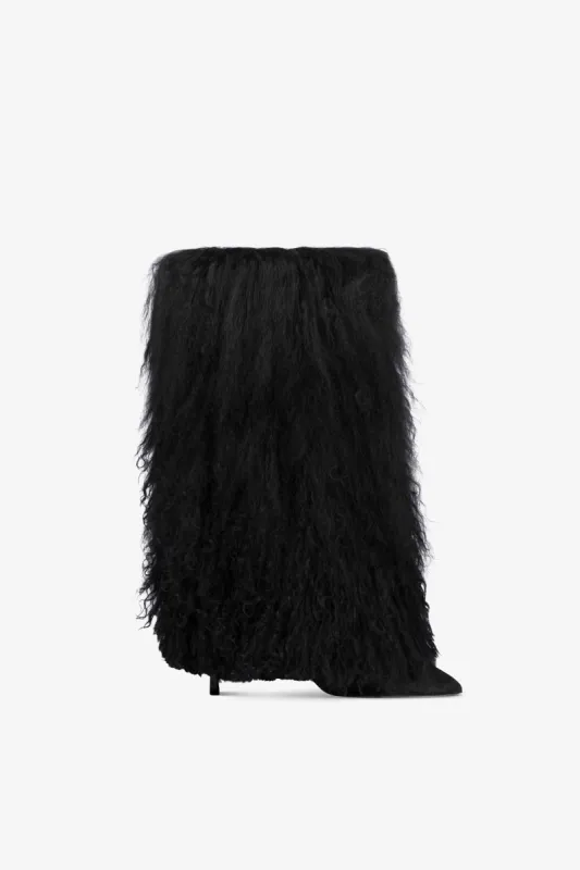 Boots in off-black faux fur sold by Paris Texas