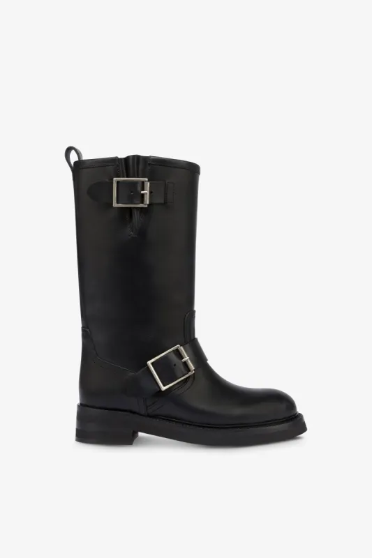 Boots in black brushed leather sold by Paris Texas