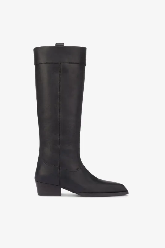 Calf-length boots in soft black pebble leather sold by Paris Texas