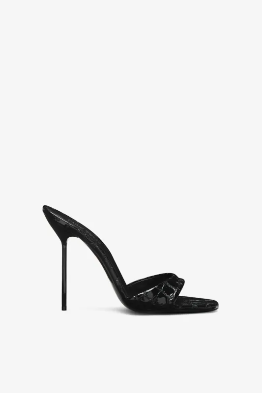 Black embossed leather mule sold by Paris Texas