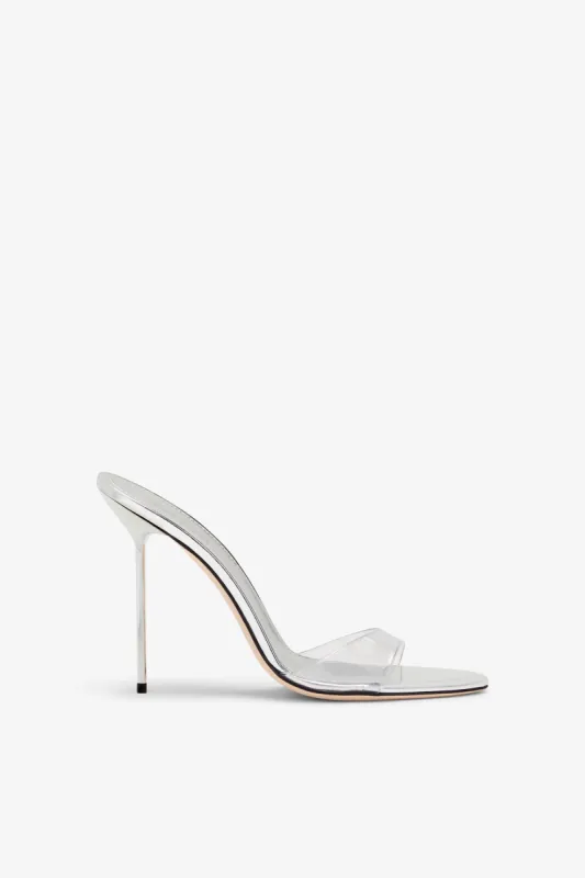 Silver metallic leather and pvc mules sold by Paris Texas
