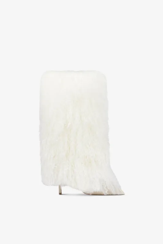 Boots in suede and white mongolian fur sold by Paris Texas