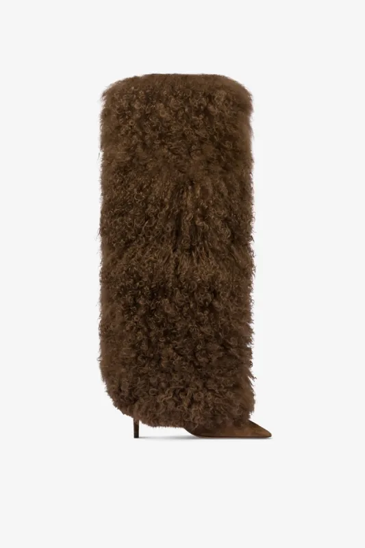 Boots in suede and brown mongolian fur sold by Paris Texas