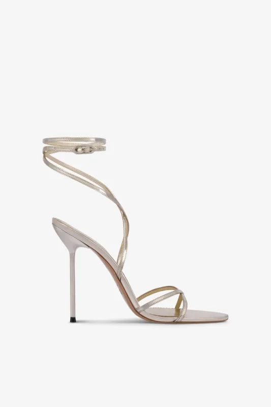 Lace-up sandals in platinum mirror-effect leather sold by Paris Texas