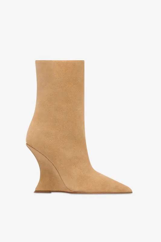 Boots in caramel suede leather sold by Paris Texas