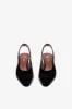 Slingbacks in black patent leather sold by Paris Texas
