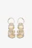Sandals in platinum mirror-effect leather sold by Paris Texas