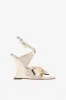 Sandals in platinum mirror-effect leather sold by Paris Texas