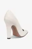 Pumps in off-white leather sold by Paris Texas