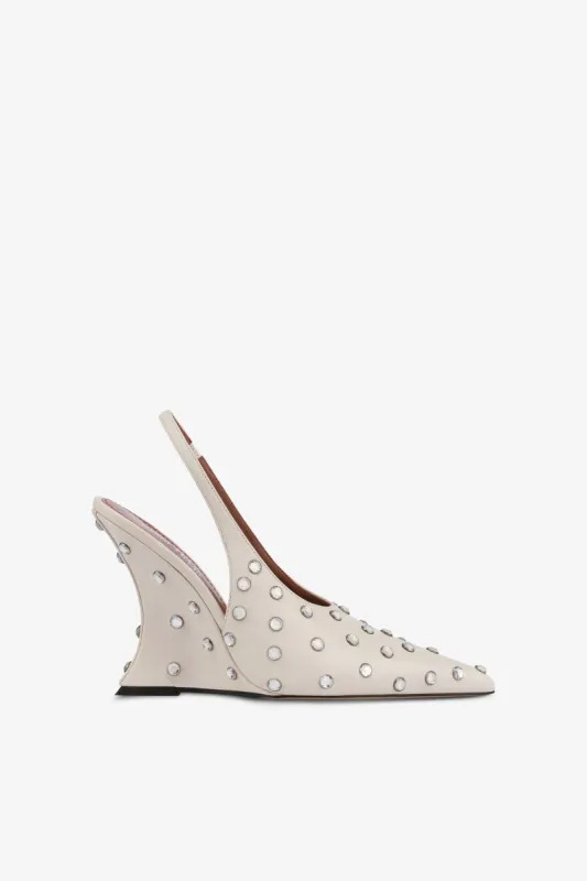 Slingbacks in milk white leather and crystals sold by Paris Texas