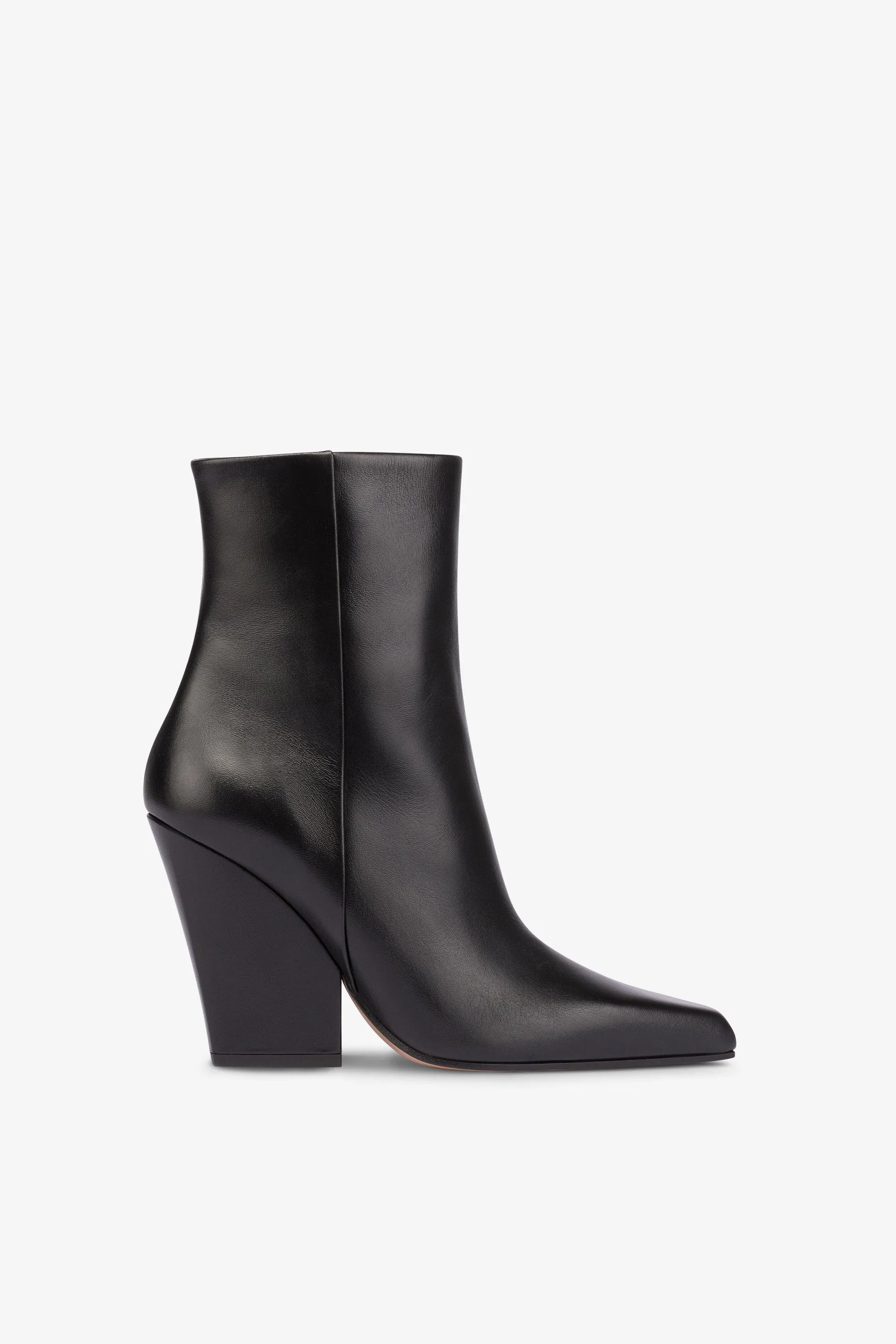 Pointed ankle boots in smooth black leather sold by Paris Texas