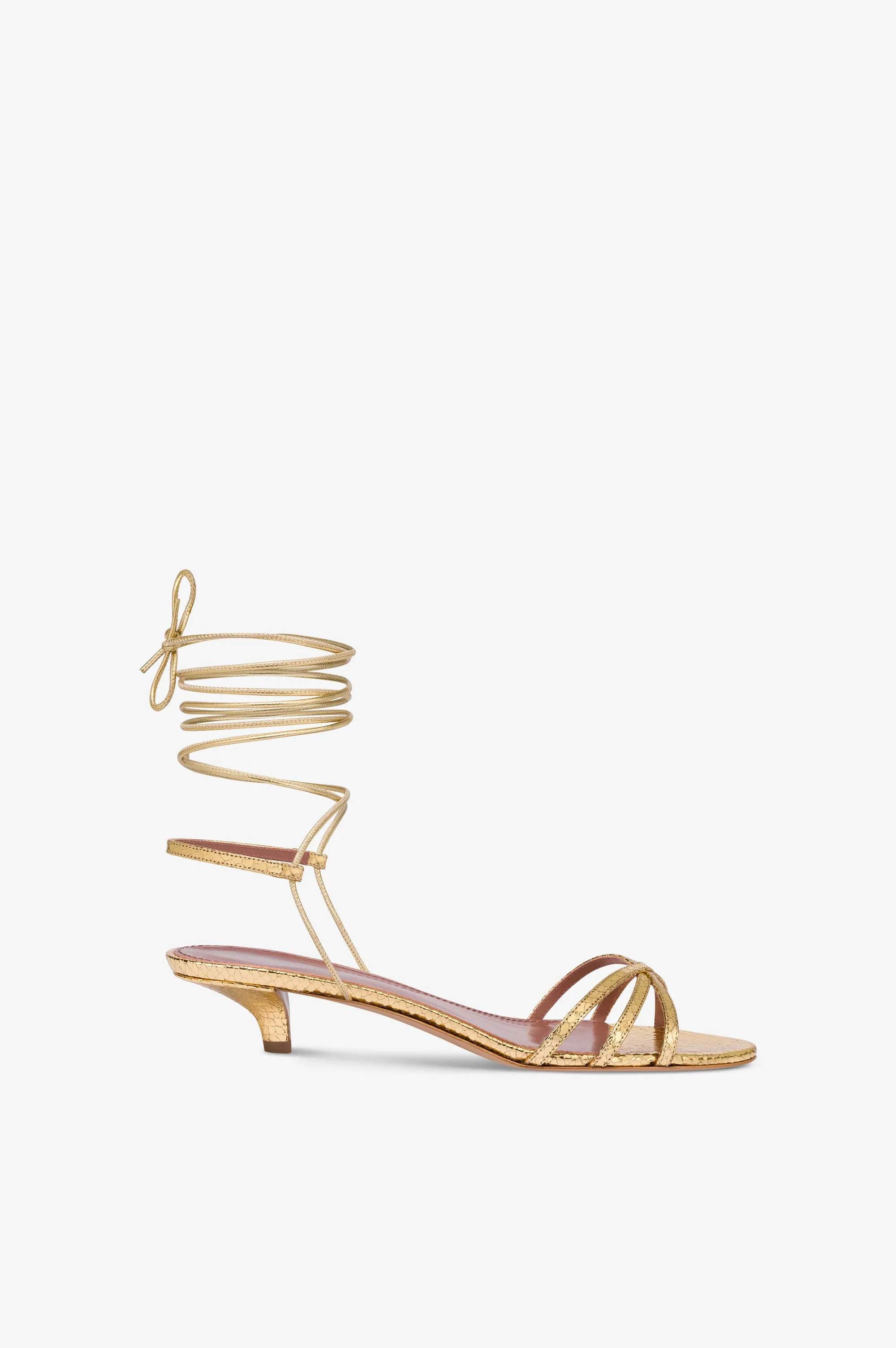 Lace-up sandals in gold metallic python-print leather sold by Paris Texas